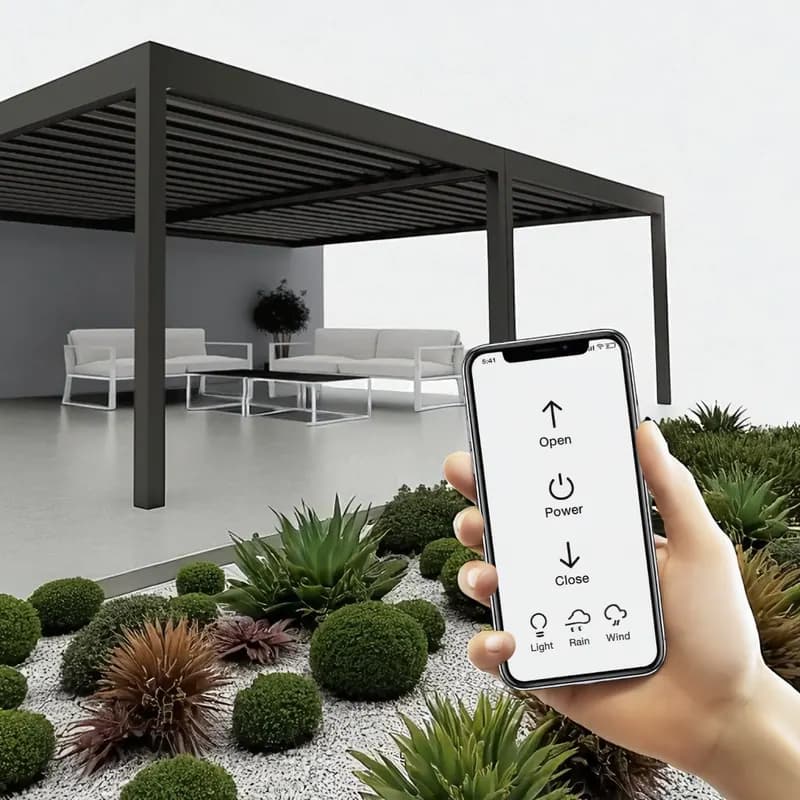 A hand holding a phone with the pergola control app in front of a dark louvred pergola